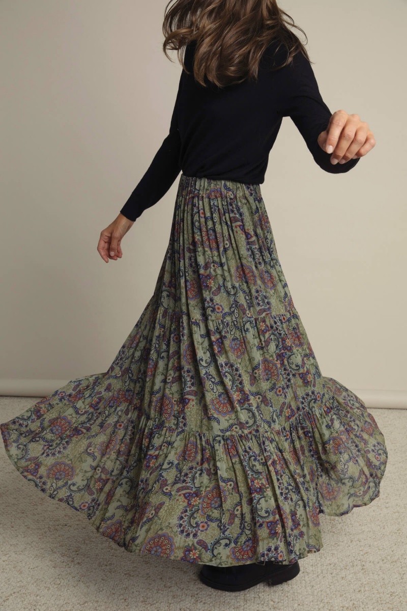 Fluid printed long skirt with frills at ...